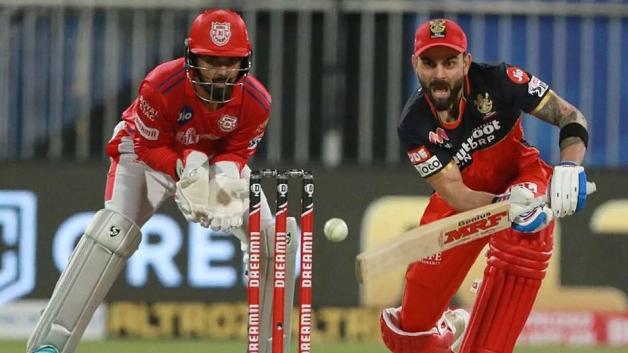RCB vs PBKS. RCB defeated PBKS by 6 runs and qualifies for playoffs of the Vivo IPL 2021. PBKS vs RCB highlights, Match report
